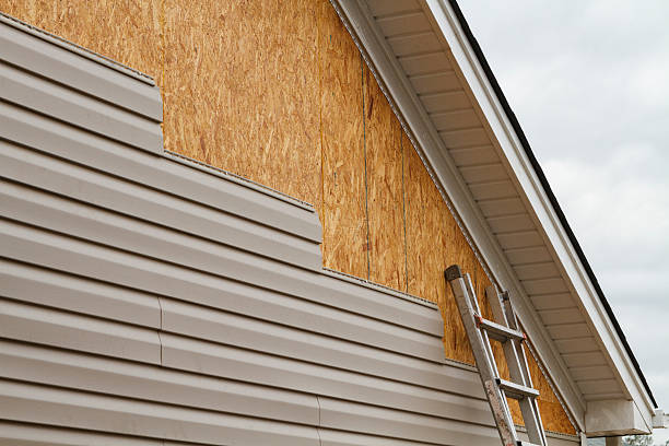 Professional Emergency Siding Repair technician working in Candor, NC